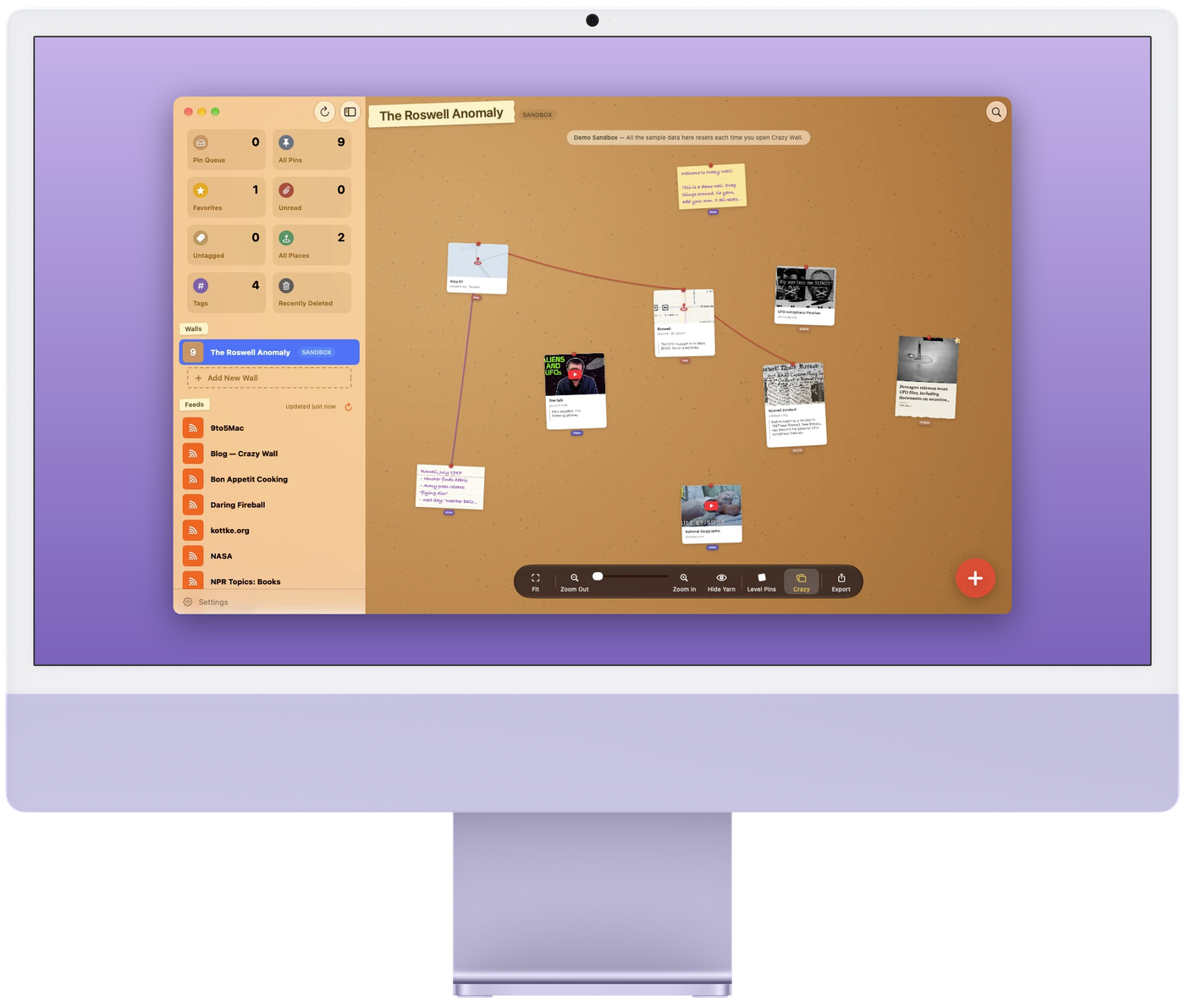 Crazy Wall on an iMac: The Roswell Anomaly in Crazy, with cards spread across the cork and red and purple yarn tied between a note, two maps and a newspaper clipping.